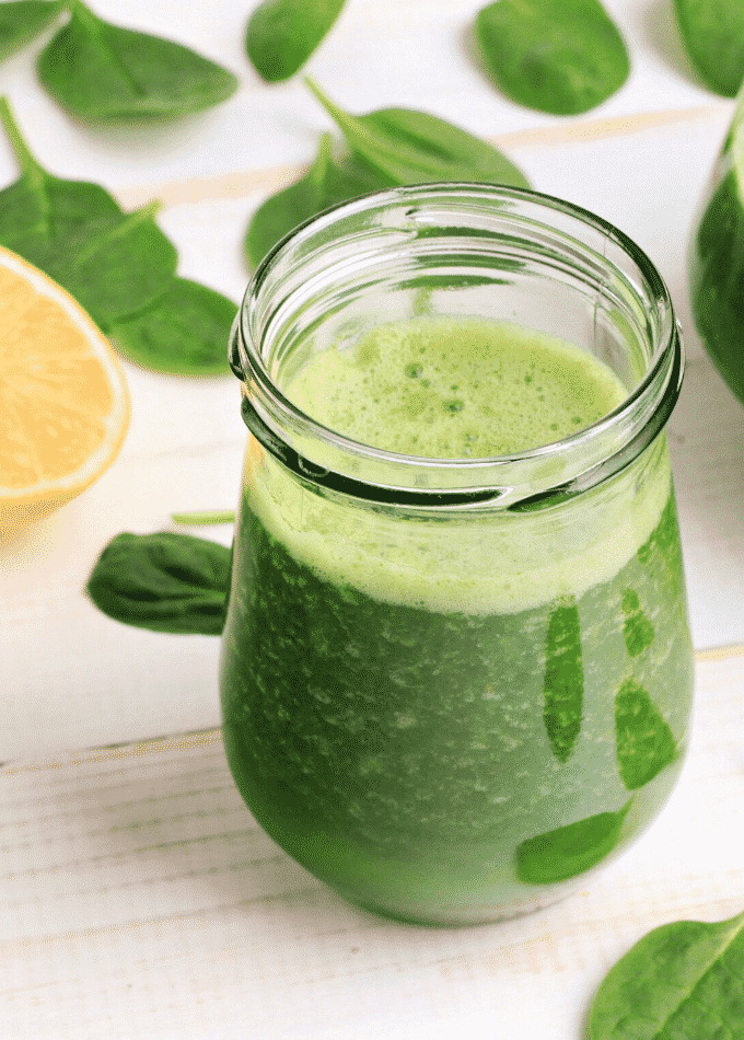 glass of green juice from vegetables