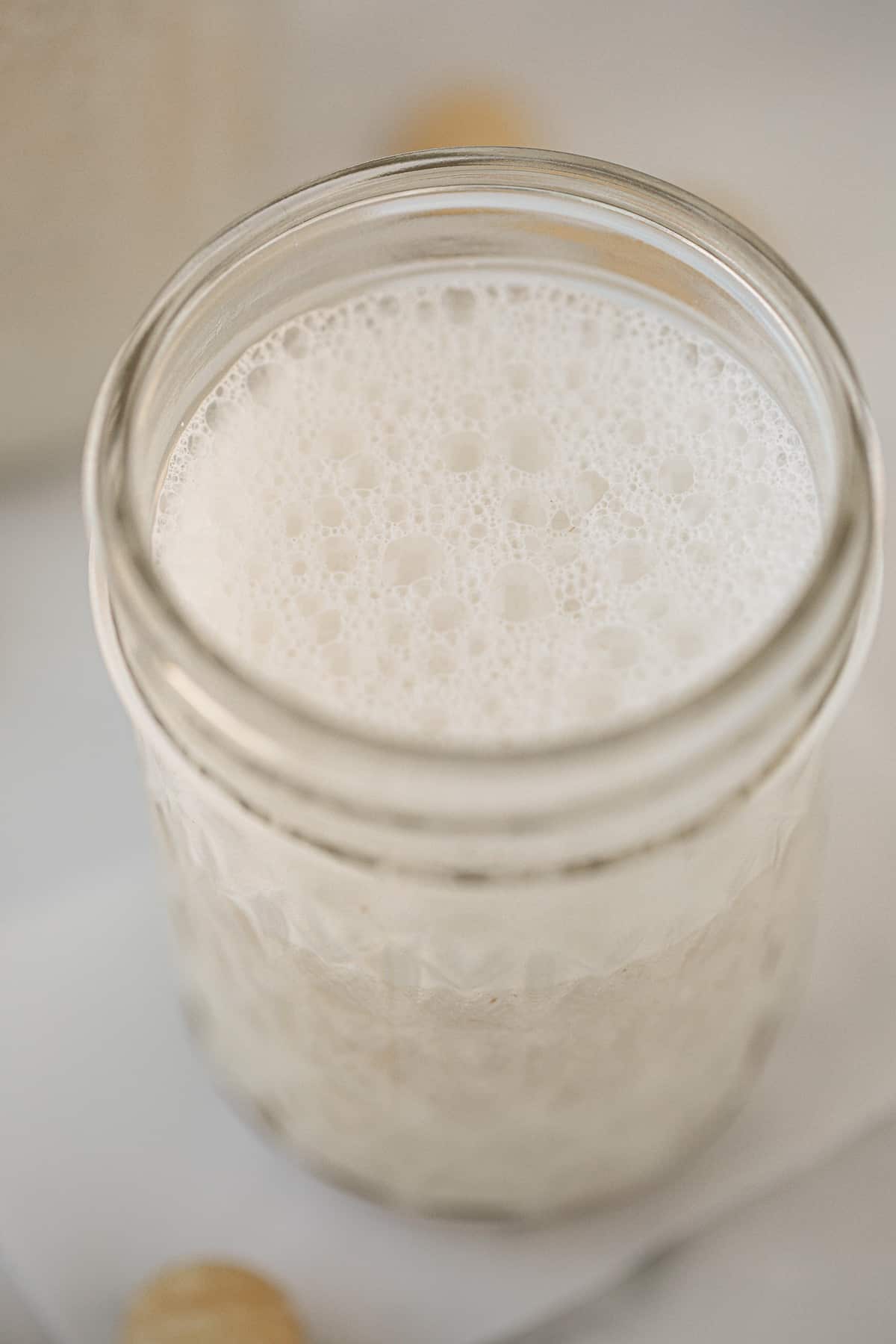 jar of macadamia milk ready to be used