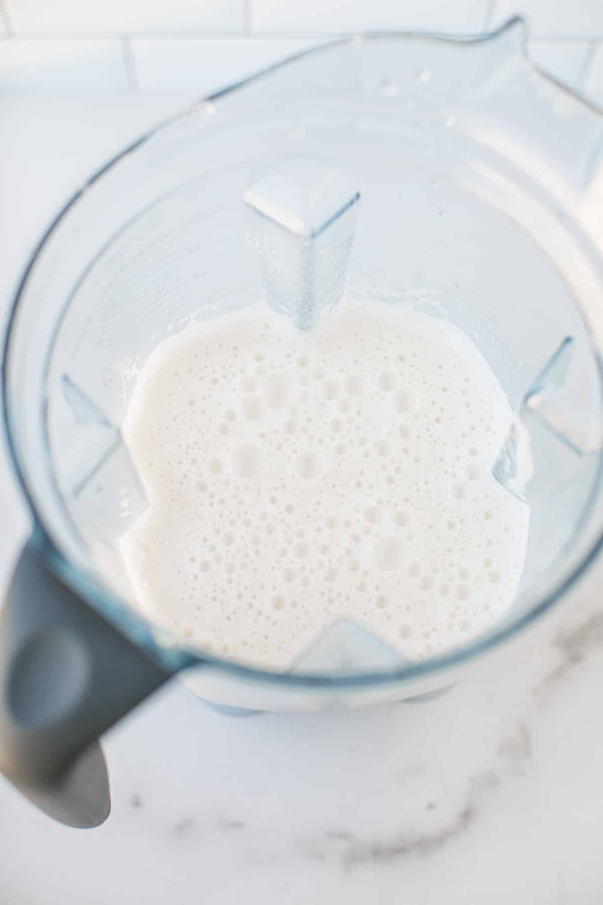 blended macadamia milk in a vitamix.