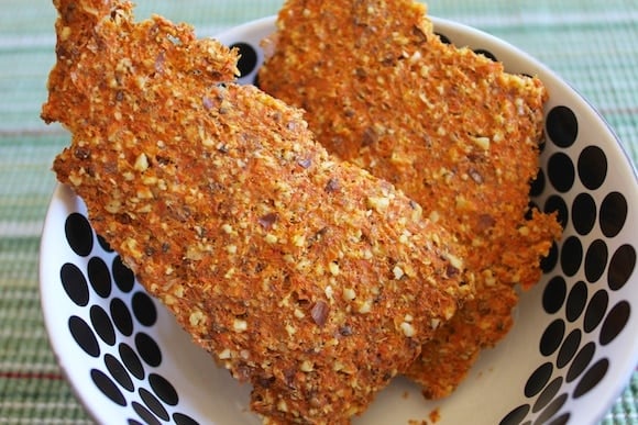 Carrot pulp crackers in a bowl.
