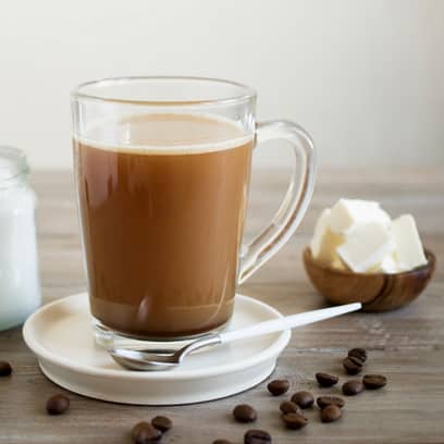 Bulletproof coffee, blended with organic butter and MCT coconut oil, paleo, keto, ketogenic drink breakfast.