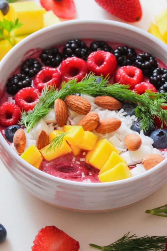 smoothie bowl with fresh berries on top