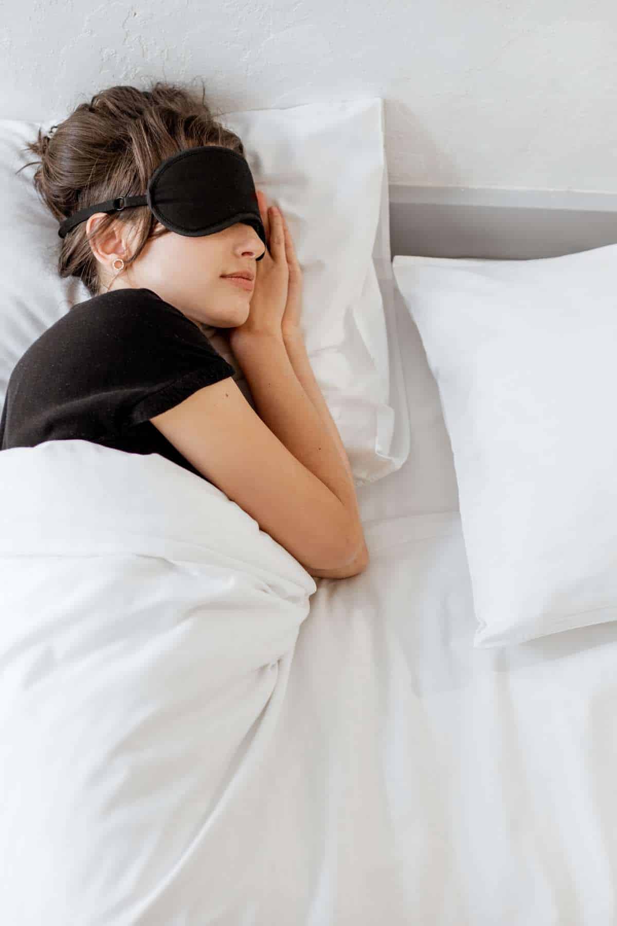 woman sleeping with eye mask