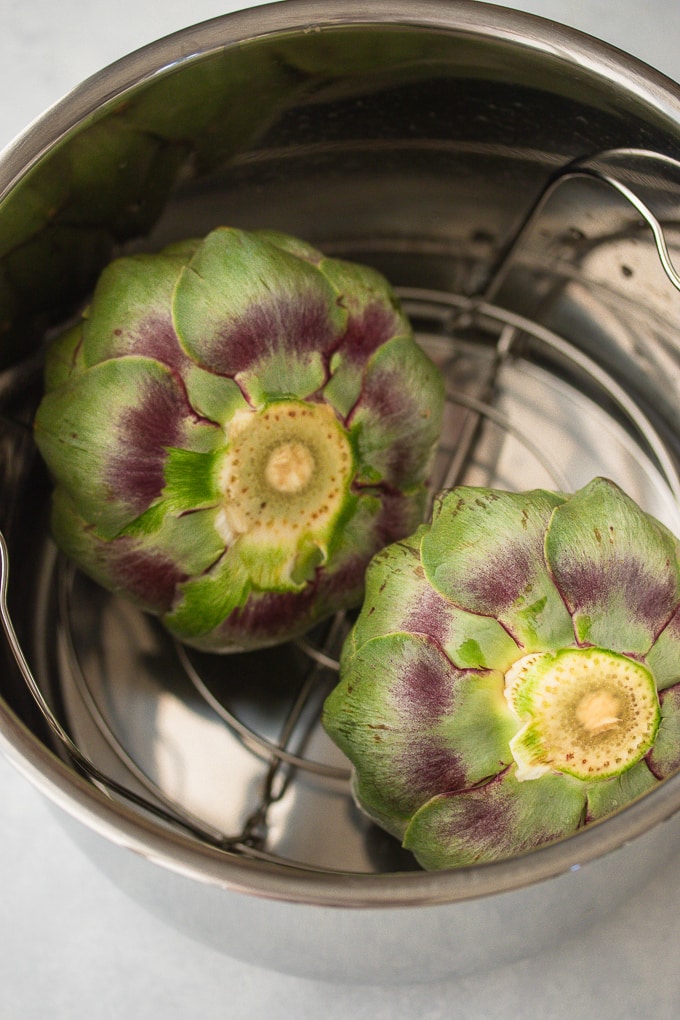 two artichokes in an instant pot pressure cooker