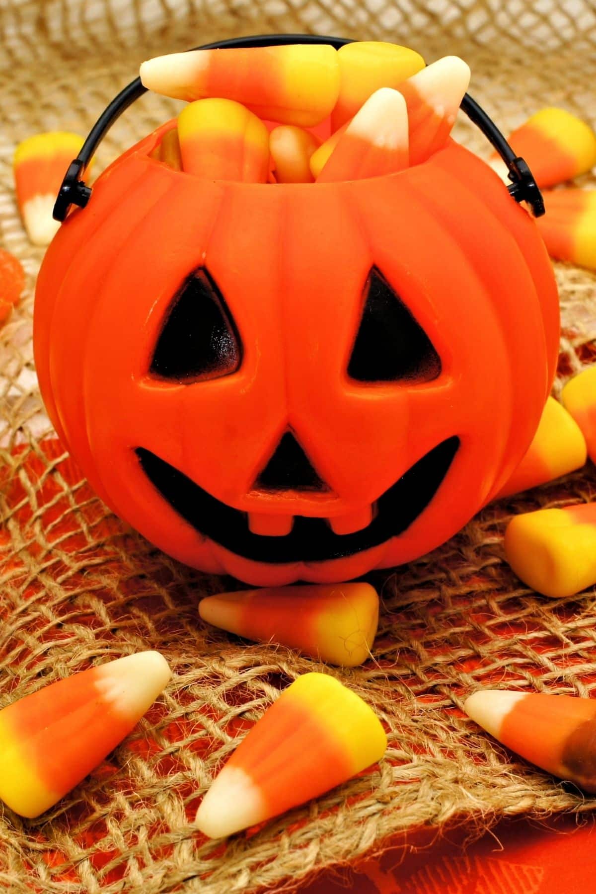 jack o lantern filled with candy corn.
