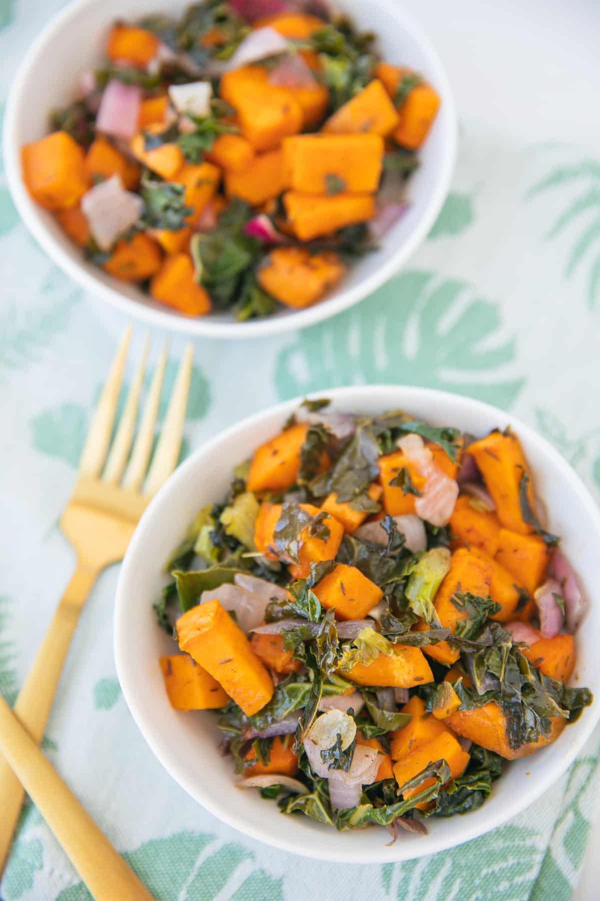 two bowls of kale sweet potato casserole