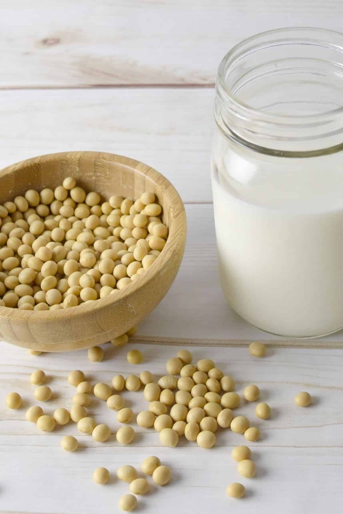 soy beans and a jar of soy milk
