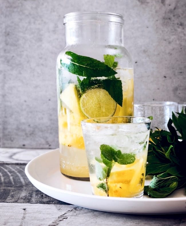 lemon water in a glass carafe.