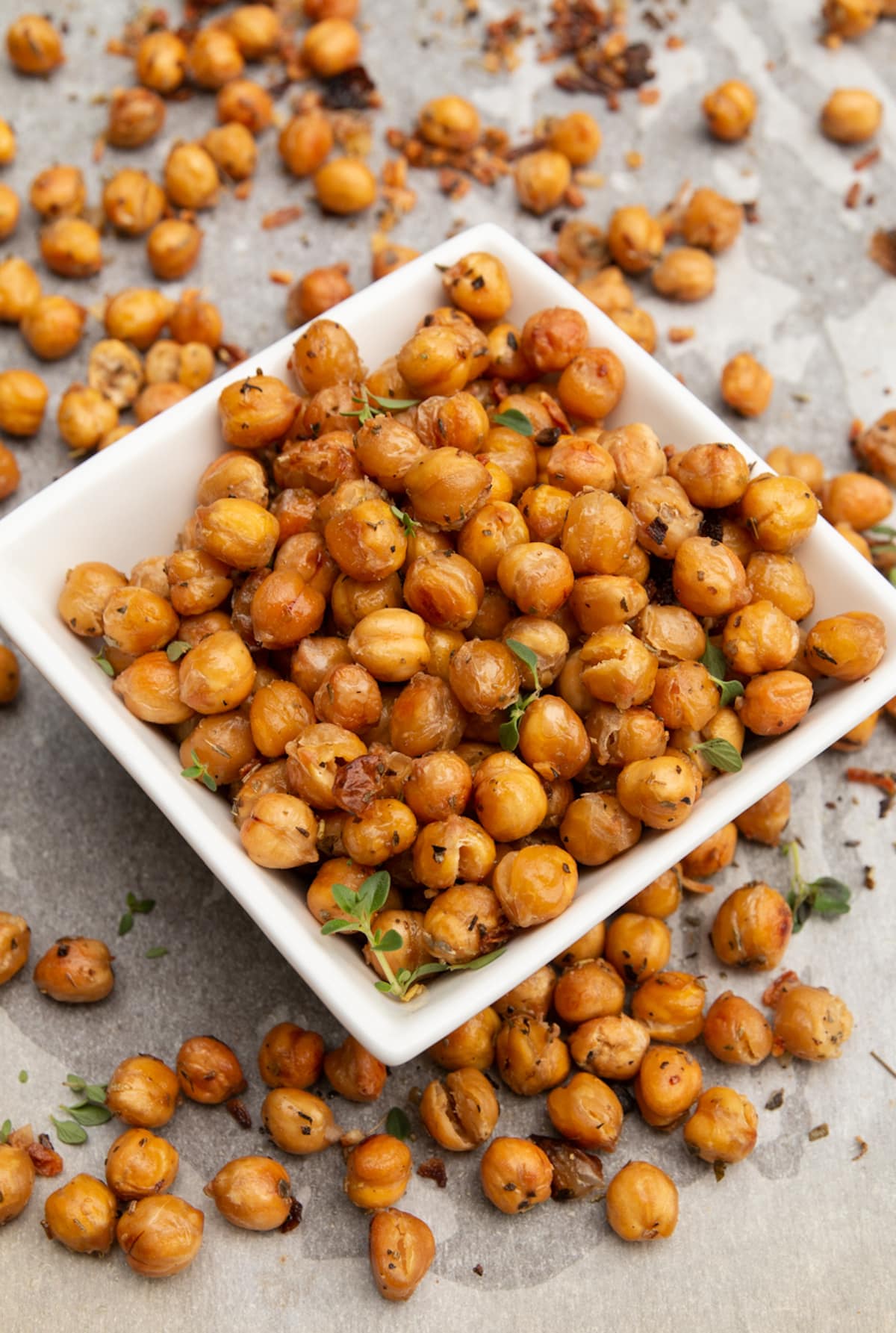 garlic roasted chickpeas in a white serving bowl