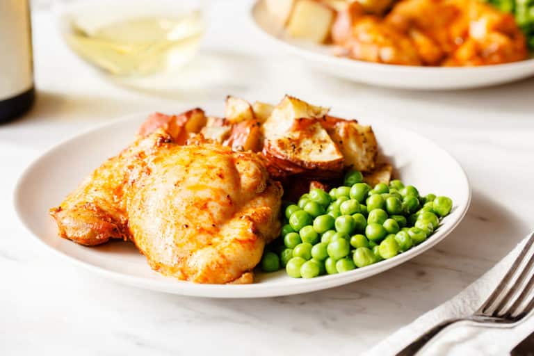 paprika-baked-boneless-chicken-thighs with peas