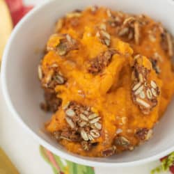 bowl of sweet potato souffle with a crunchy topping