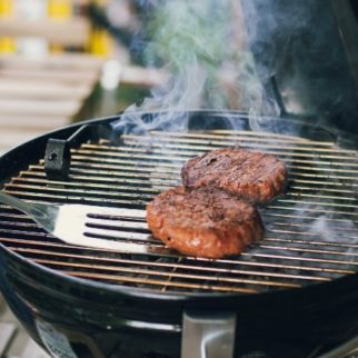 A pan of food on a grill, with Grilling