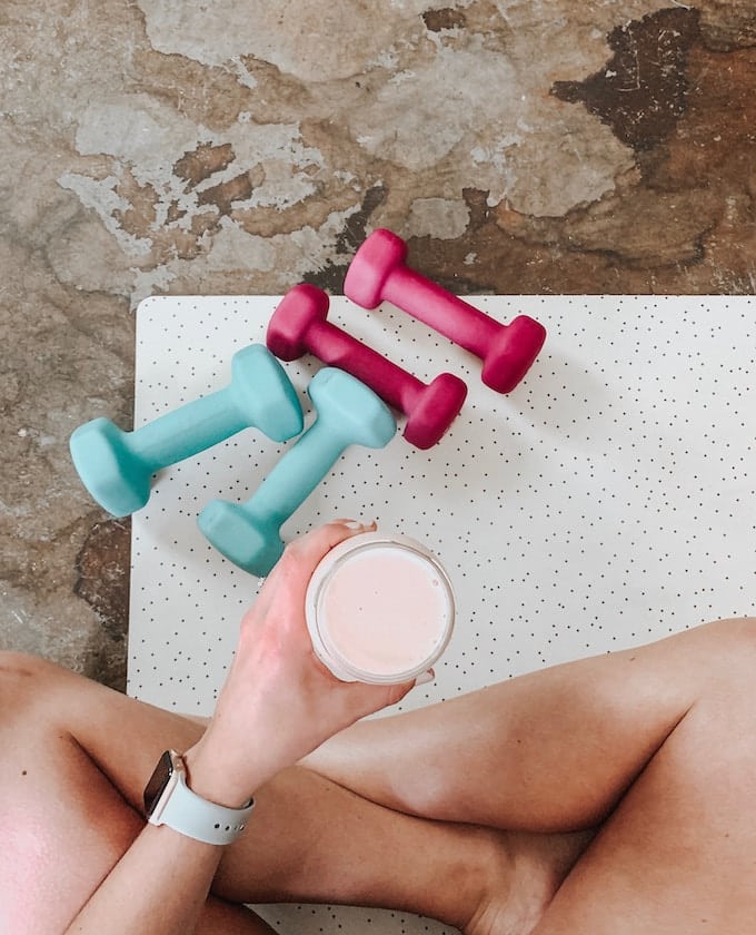 woman exercising with hand weights.