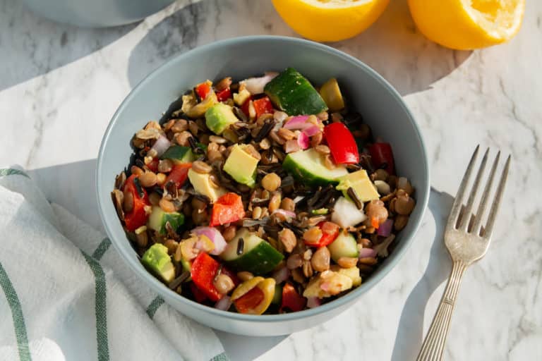 Wild Rice and lentil salad served in bowl.