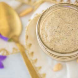 jar of chia pudding with a gold spoon