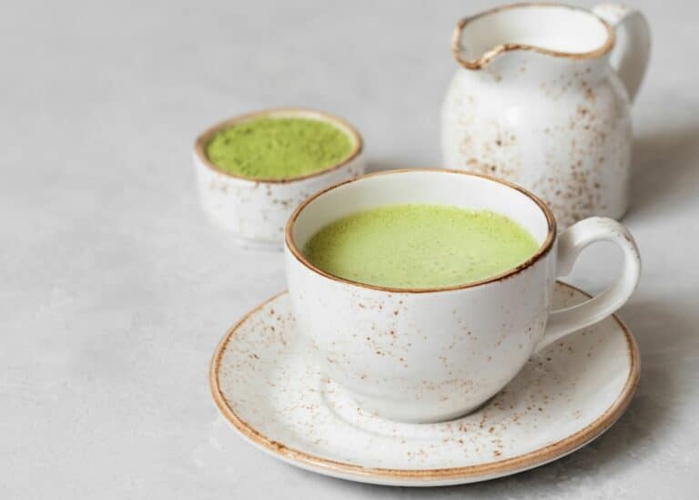 matcha latte in pretty ceramic mug.