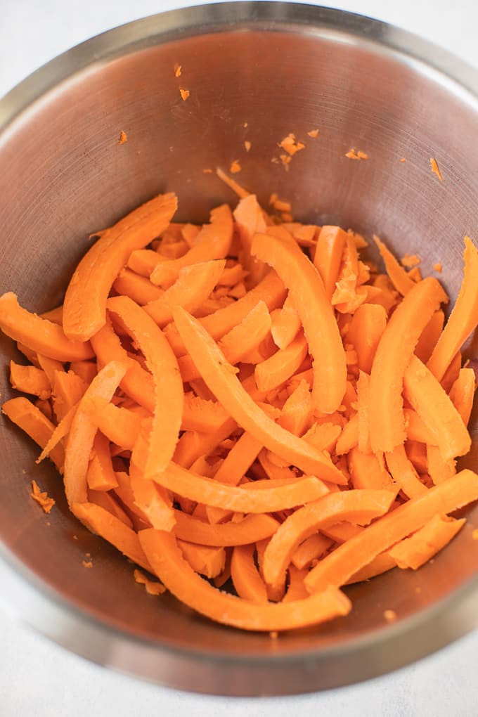 air fryer sweet potato fries ready to be baked