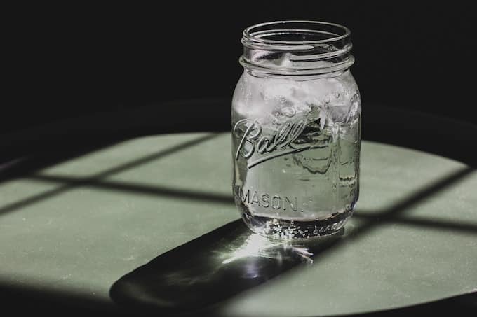 glass of water on table.