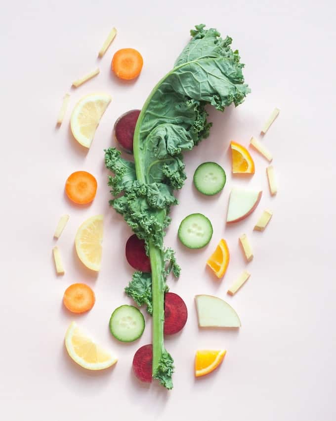 vegetables and fruit on a tabletop.