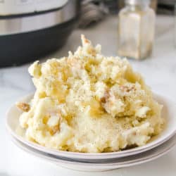 instant pot mashed potatoes served on white plate