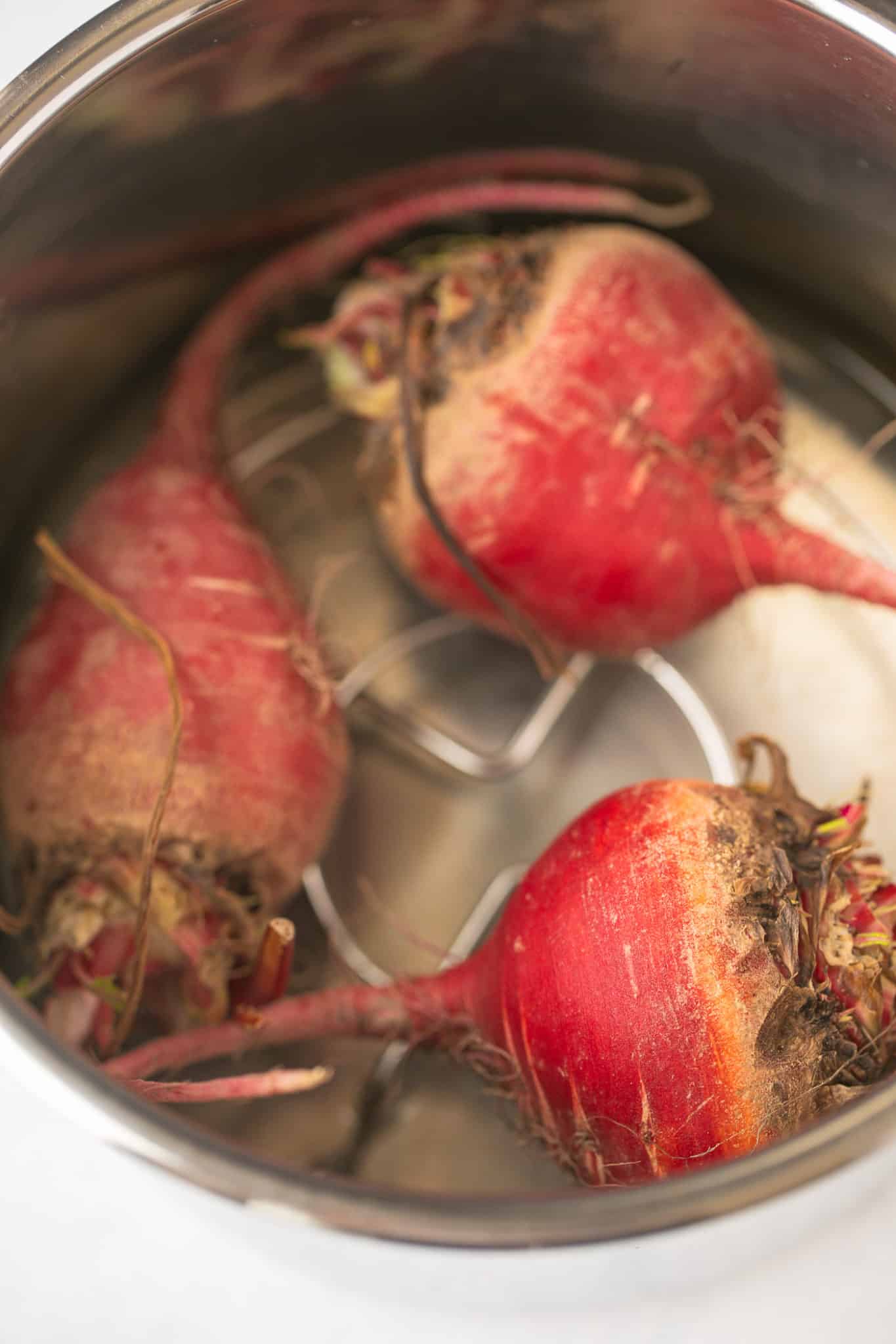 uncooked beets in Instant Pot.