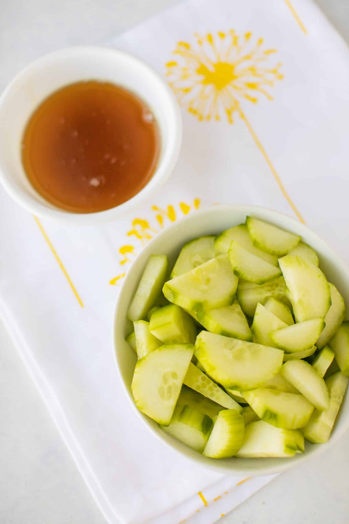 sliced cucumbers with dressing