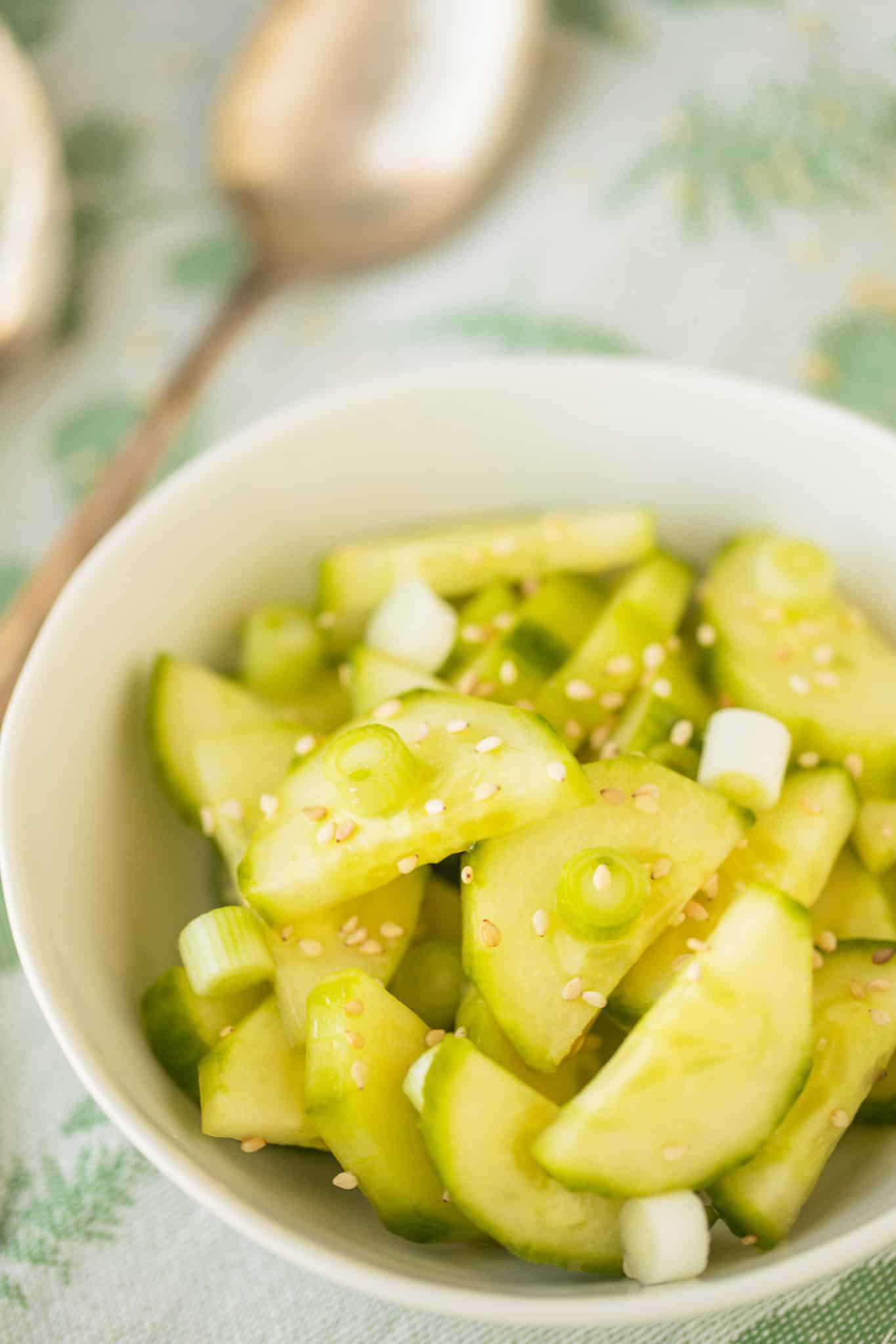 keto cucumber salad served with sesame seeds on top