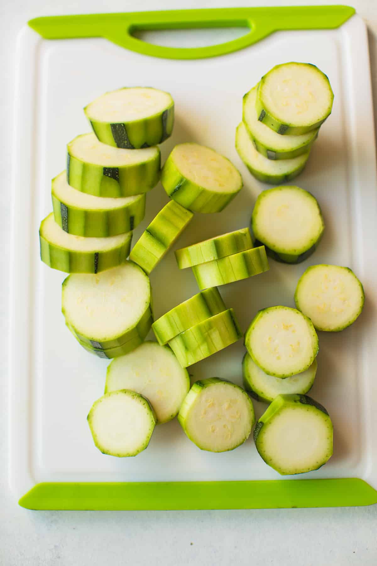 sliced zucchini on a cutting board