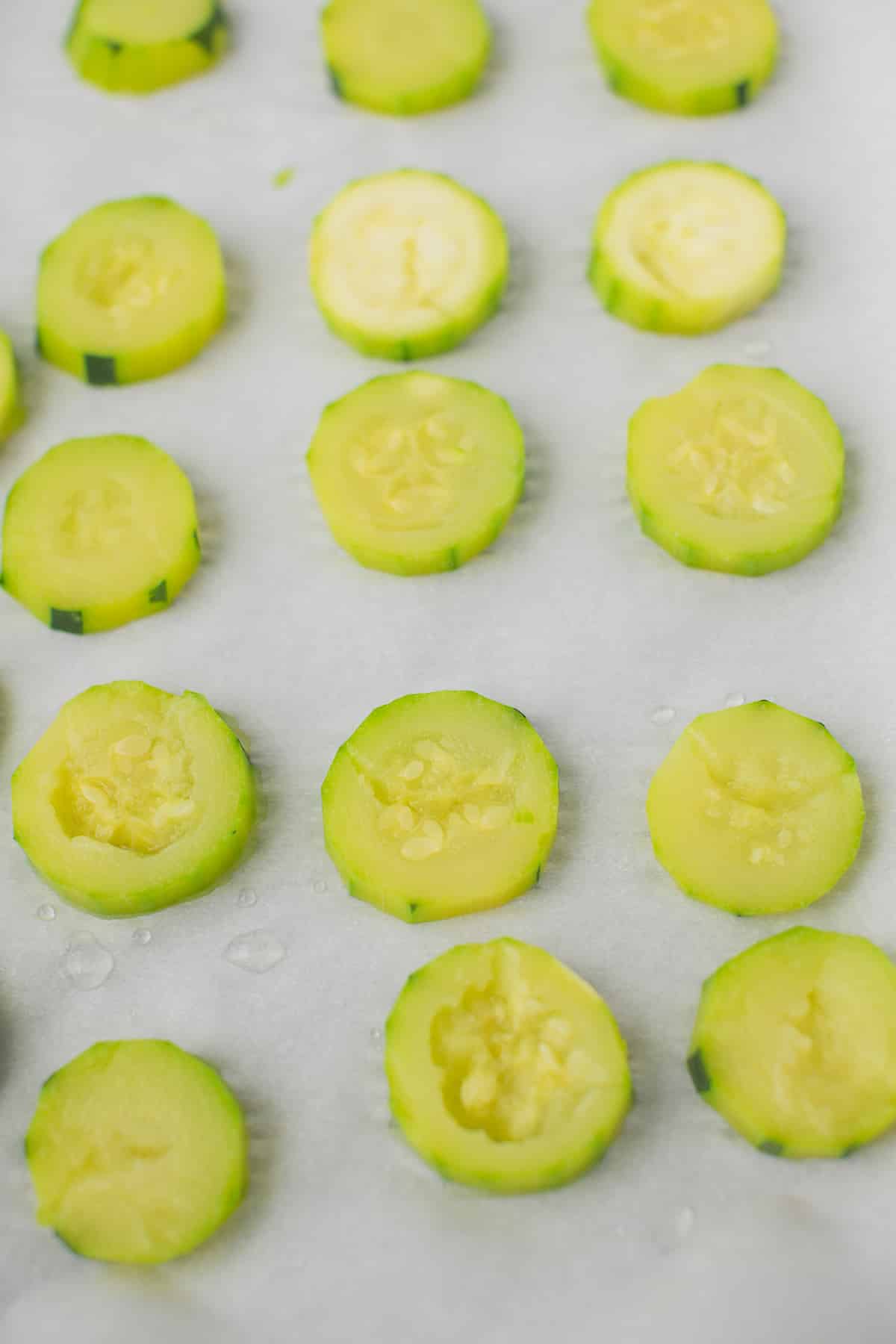 steamed zucchini slices for freezing.