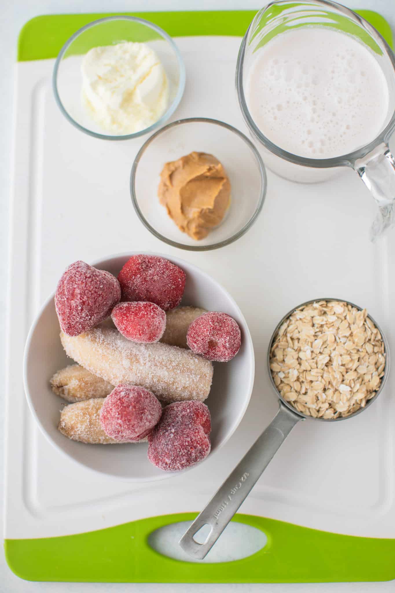 ingredients for smoothie on a cutting board