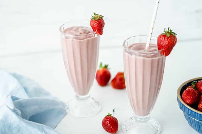 banana beet smoothie in two glasses