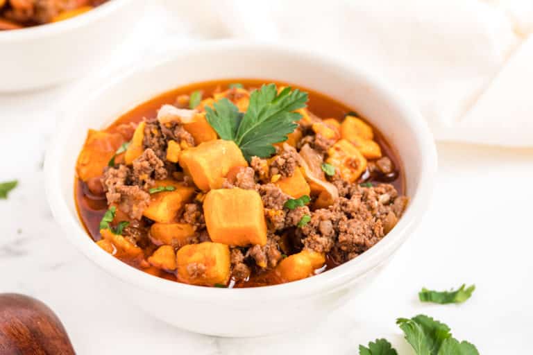 instant pot sweet potato and beef chili served in a white bowl