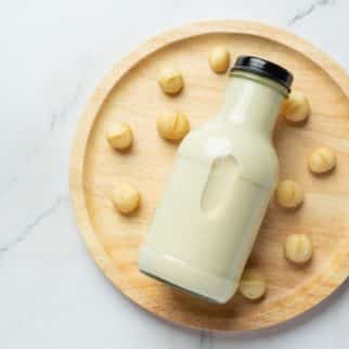 jar of macadamia nut milk on a tray.