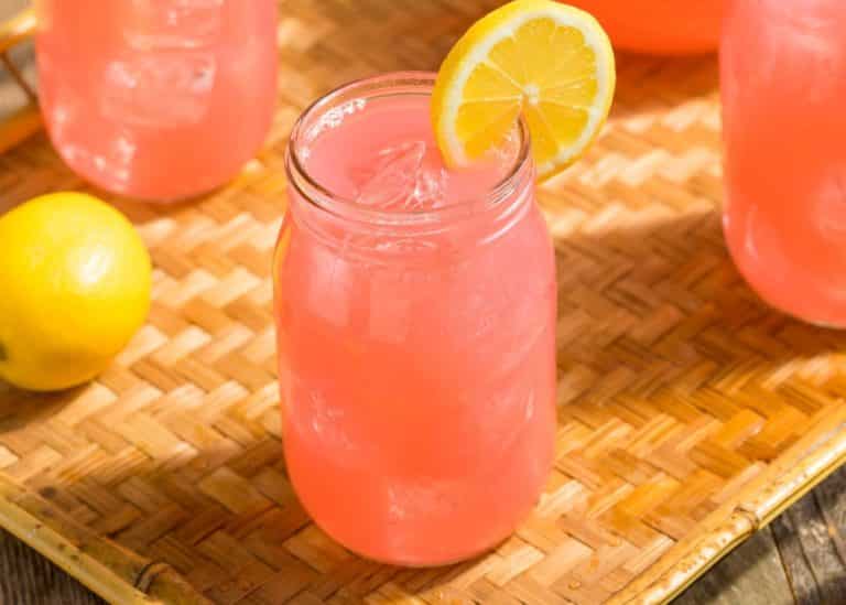 pink kombucha lemonade on tabletop.