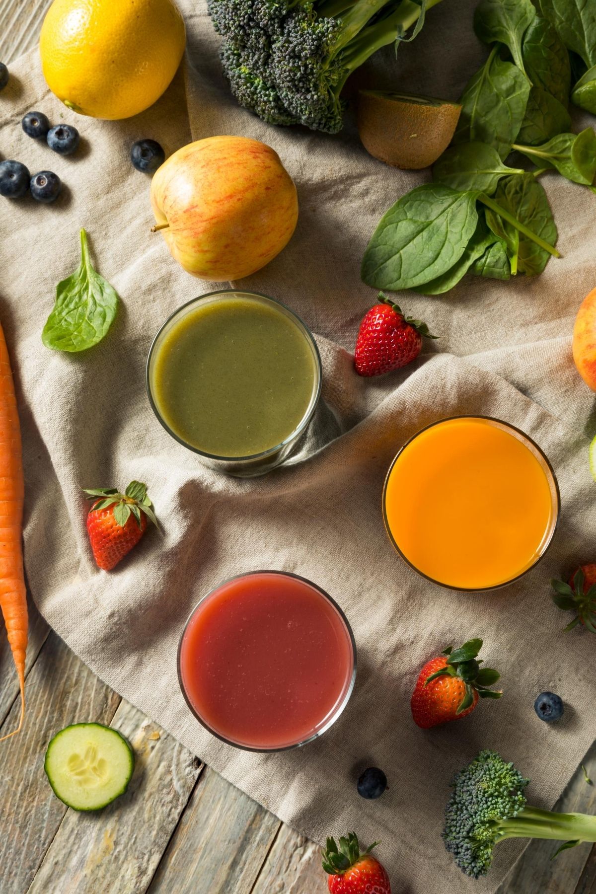 vegetable and fruit juices on a countertop
