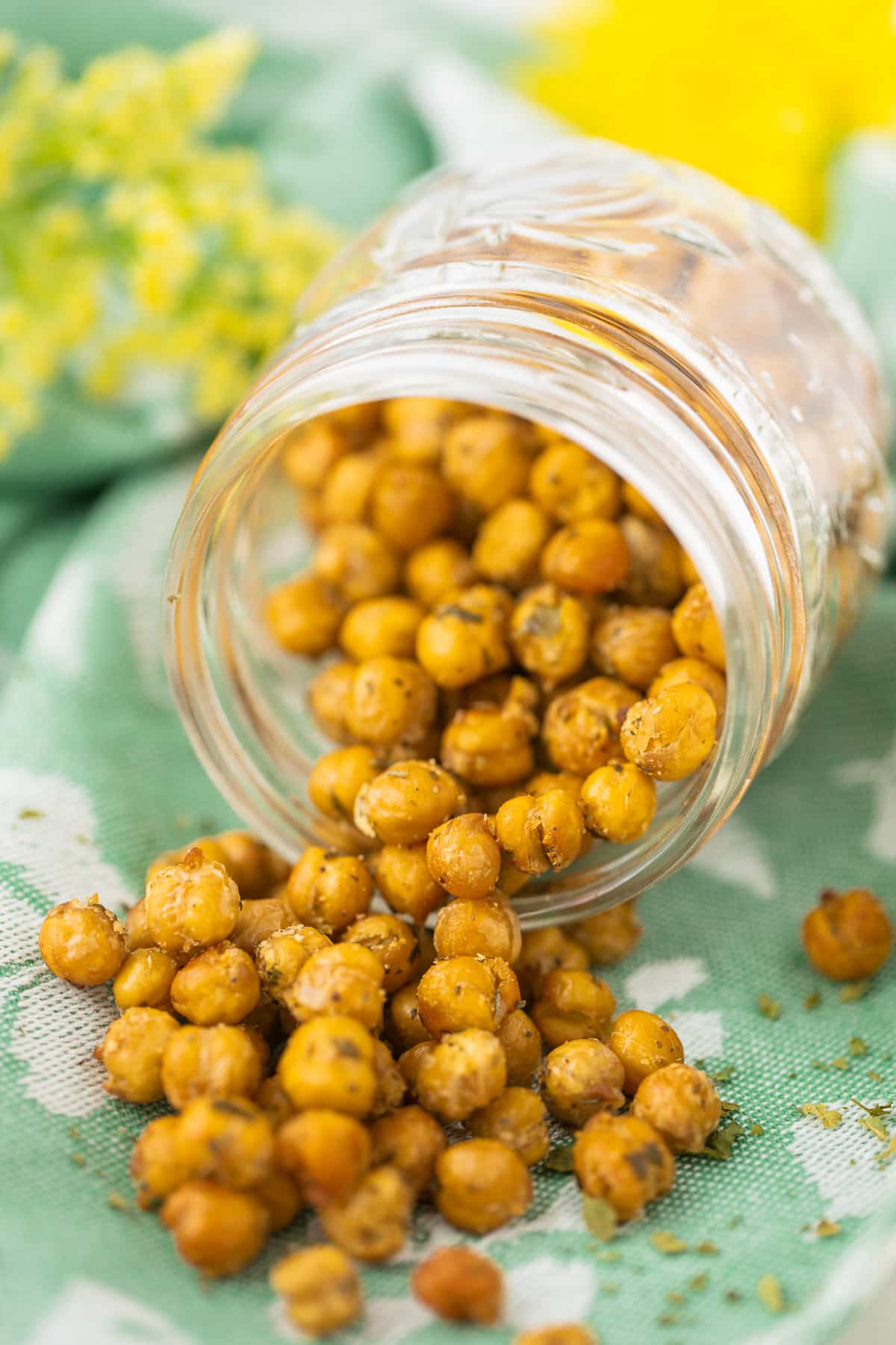 air fryer crispy chickpeas pouring out of a jar