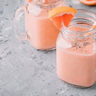 grapefruit smoothie on table.