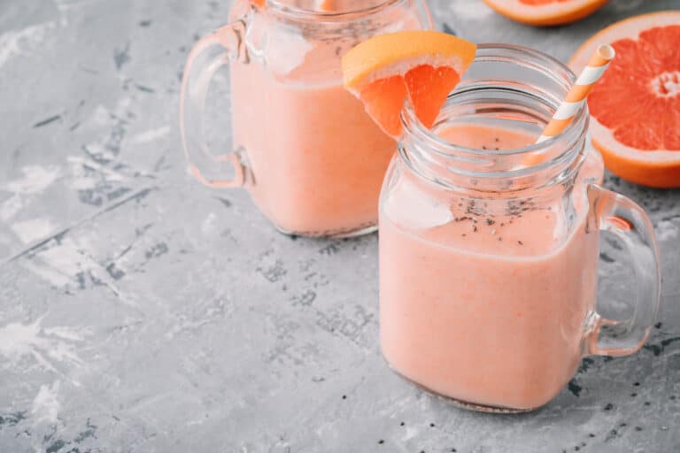 grapefruit smoothie on table.