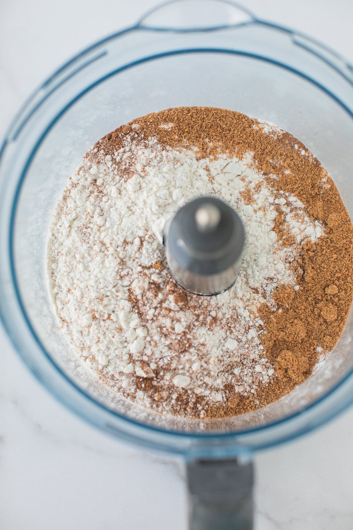dry ingredients for scones in the bowl of a food processor