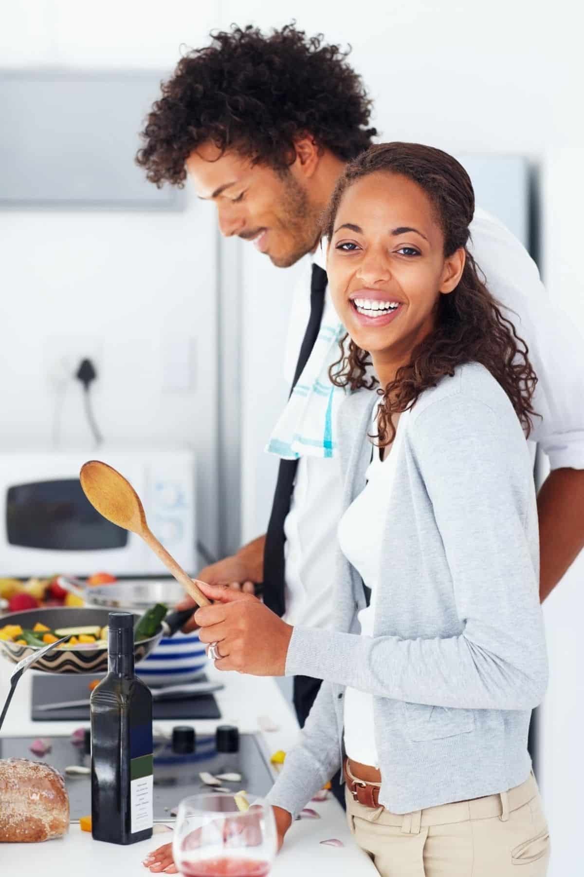 young couple cooking together
