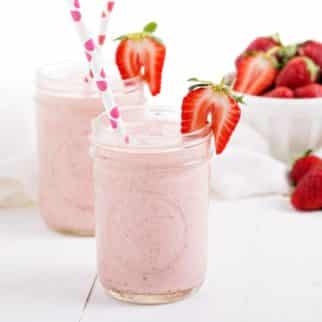 strawberry milkshake in two jars