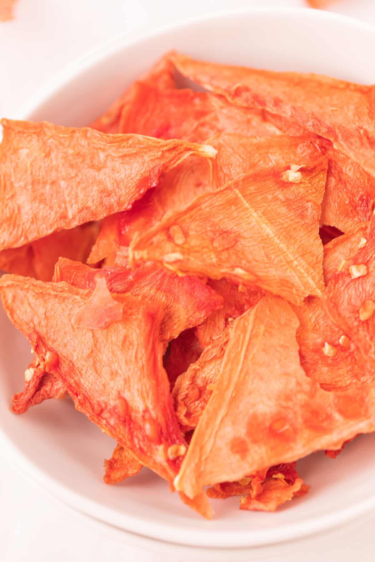 dehydrated watermelon jerky in a bowl ready to eat.