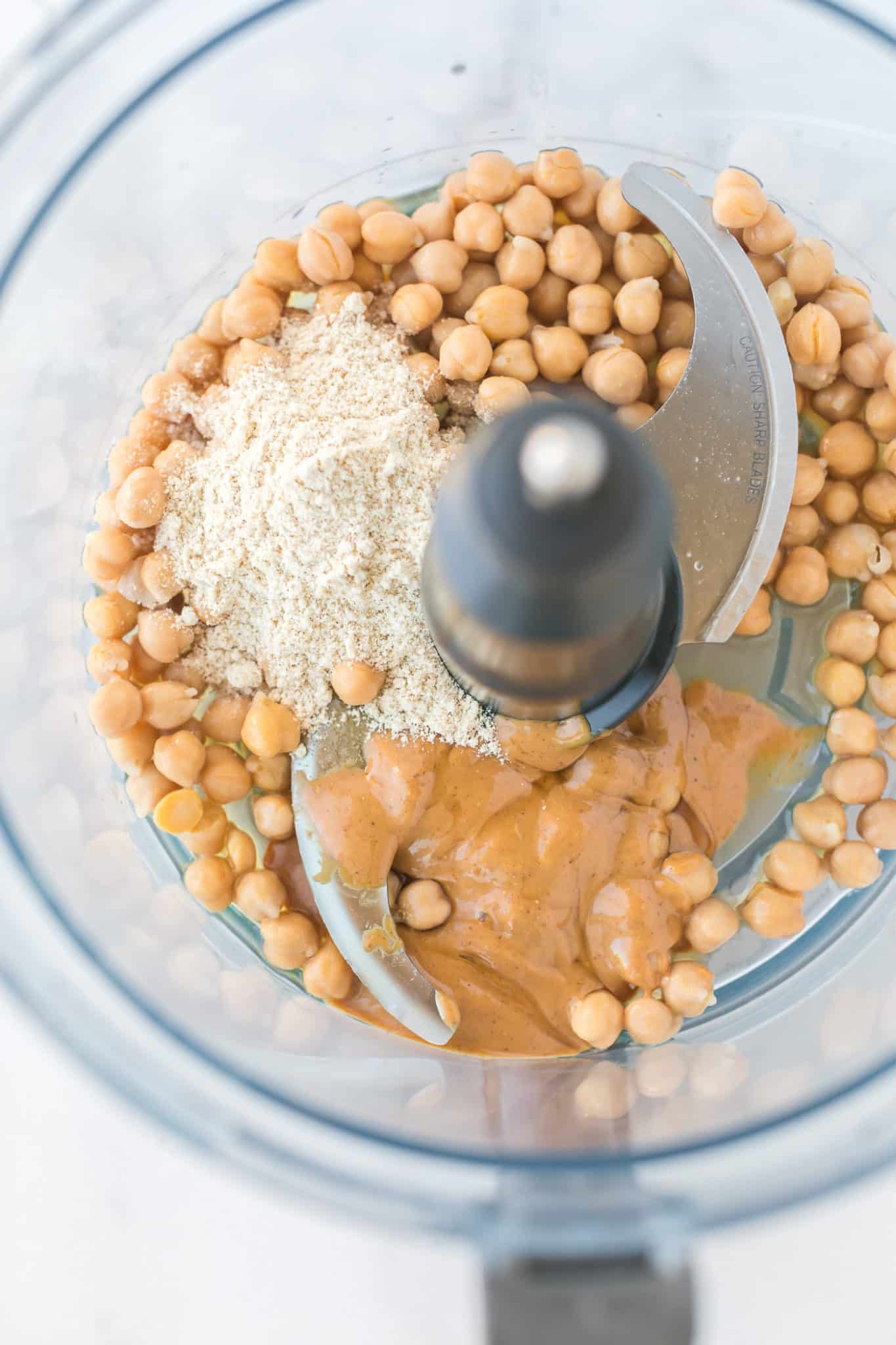ingredients for chickpea cookie dough in a food processor