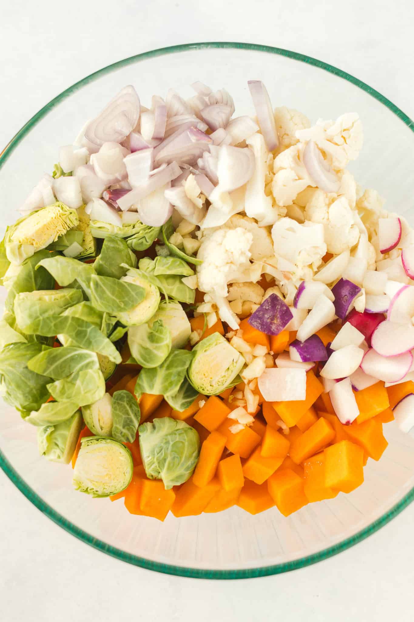 chopped vegetables in a mixing bowl for veggie bowl recipe.