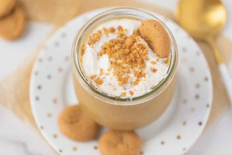 gingerbread smoothie served in a jar with cookies