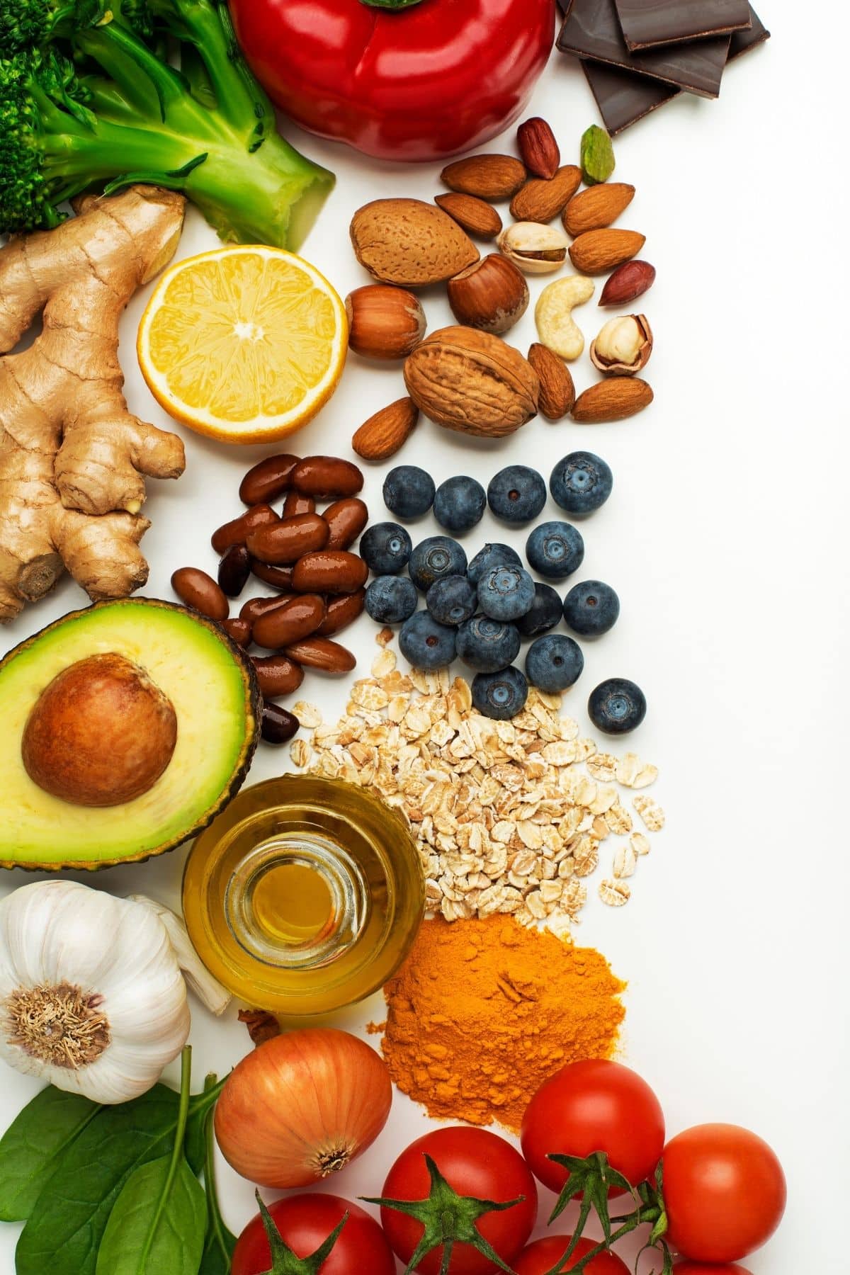 buffet of healthy foods including berries, beans, and vegetables.