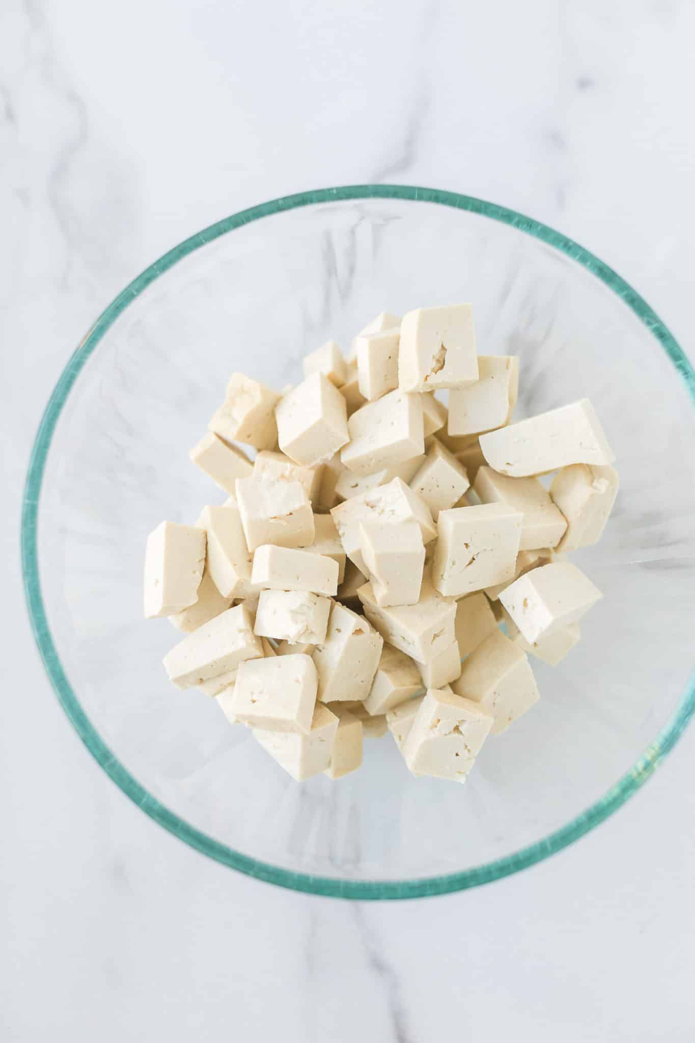 cubed extra firm tofu in a bowl