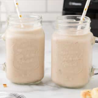 peanut butter cauliflower smoothie with straws.