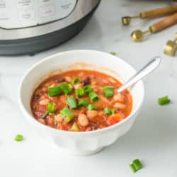 bowl of bean soup with a spoon