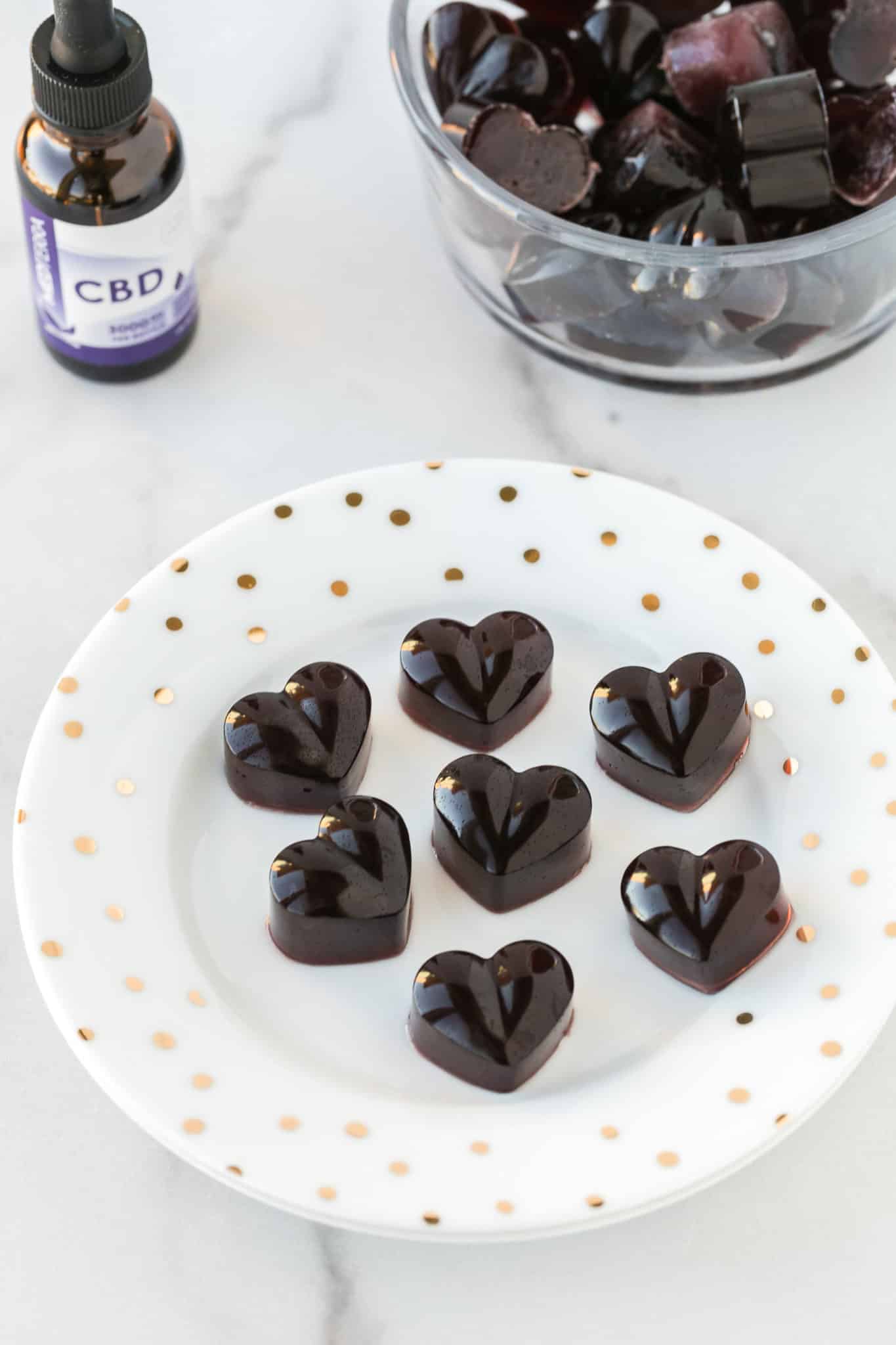 plate of CBD gummies served with a CBD tincture.